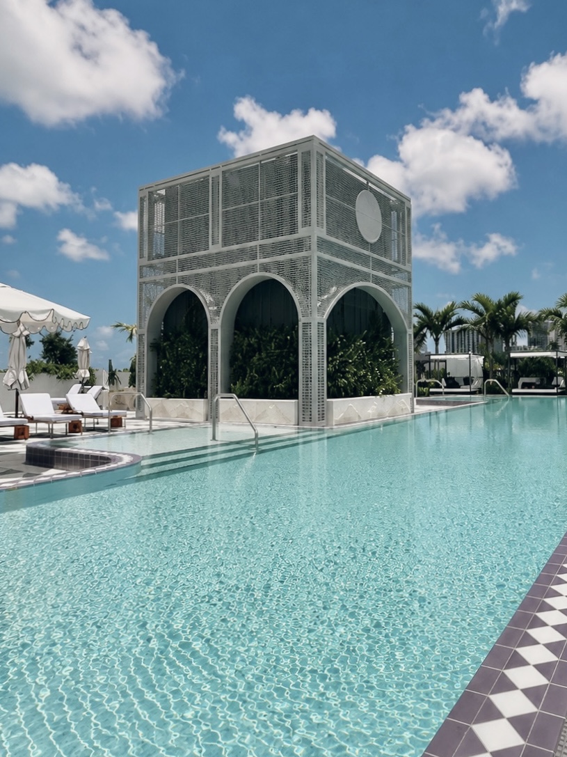NoMad Wynwood rooftop pool with arched cabana and Miami skyline